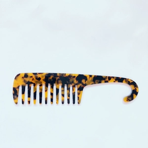 Classic tortoiseshell acetate wide-tooth comb with hanging hook for detangling hair