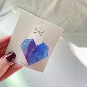 Cute heart hair clip with blue-purple marble gradient and glitter on display card