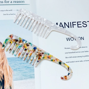Set of two wide tooth acetate hair combs with hooks in marble and colorful patterns