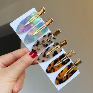 Set of 6 acetate hair clips in gradient purple, leopard print and tortoiseshell designs