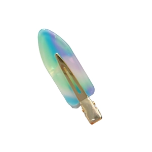 Iridescent acetate hair clip with gold metal base featuring a colorful gradient finish