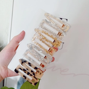 8-piece set of transparent acrylic hair clips with gold foil and marble patterns