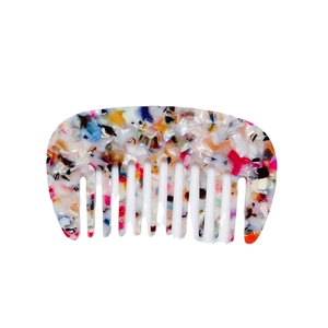 Minimalist wide-tooth acetate hair comb with vibrant multicolored floral texture