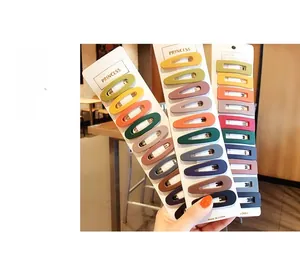 Matte macaron hair clips set with water drop and rectangle shapes on display card