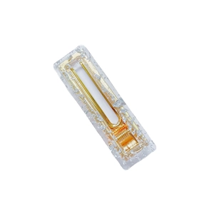 Minimalist transparent acrylic hair clip with silver foil flakes and golden duckbill clip