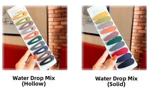 Detailed view of matte finish colorful snap hair clips in hollow and solid teardrop styles