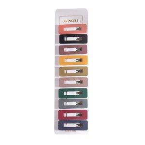 Set of 10 matte rectangular hair clips in assorted colors on a white display card