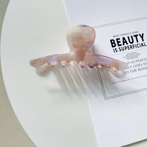 Grande pince à cheveux en acétate style français motif marbré rose et blanc