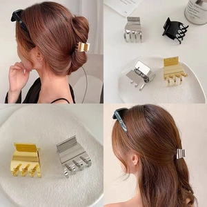 Minimalist metal shark hair claw clips in gold silver and black finishes for high ponytails