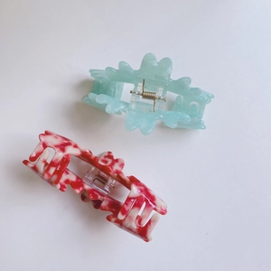 Floral claw clip set with mint green wave design and marble pattern hair accessories