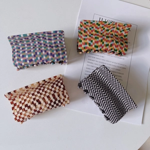 Large checkerboard acetate hair claws in various vintage plaid patterns for thick hair