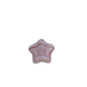 Pince à cheveux étoile en acétate avec motif marbré violet et visage souriant doré