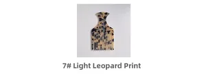 Detailed view of light leopard print cellulose acetate fine-tooth hair comb in 7# pattern