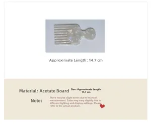 Detail of cellulose acetate hair comb showing 14.7cm size and marble texture