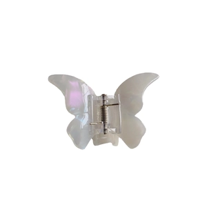 Iridescent white butterfly hair claw clip with acetate finish and metal spring