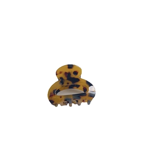French retro acetate hair claw clip with tortoise shell pattern in a mini minimalist design