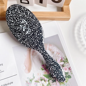 Elegant black and white marble acetate hair brush with anti-static air cushion bristles