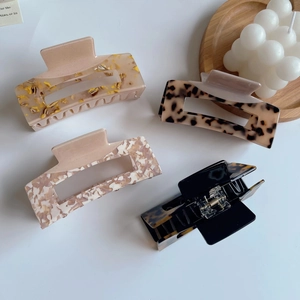 Set of four large acetate hair claw clips with various patterns for long hair accessories