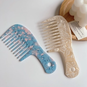 Acetate wide-tooth hair comb set with marble and cream patterns for detangling and styling