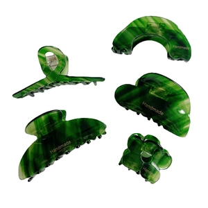 5-piece set of green marble acetate hair claws with geometric patterns and metal springs