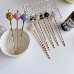 Elegant set of nine acetate ball hair pins with vintage tortoise and marble patterns