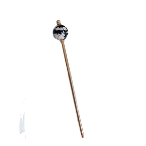 Elegant gold metal hair pin with black and white marble bead for classic buns