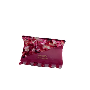 Floral marble patterned acetate hair claw clip with pink and red color block design