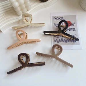Set of five large minimalist matte claw clips in neutral tones for thick hair styling