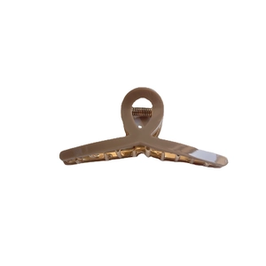 Large beige metal hair claw clip in minimalist Korean style for back of head hair styling