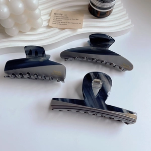 3-piece grey marble acetate hair claw set including round, square and open shapes