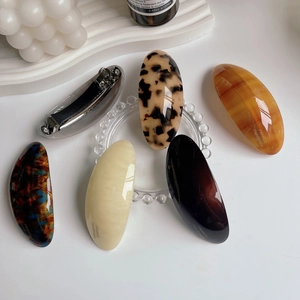 Elegant French handmade acetate hair clips set in tortoiseshell and cream finishes