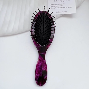 Elegant purple marble textured hairbrush with anti-static air cushion and massage bristles