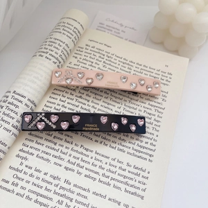 French handmade acetate hair clips with pink and black hearts and crystal rhinestones