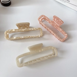 Three-piece large acetate claw clip set in marble, beige, and cream minimalist French style