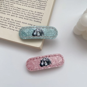 Chic cat print acetate hair clips with rhinestones in blue and pink pastel marble finish