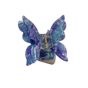 Elegant 3D butterfly hair claw clip in purple and blue acetate with textured finish