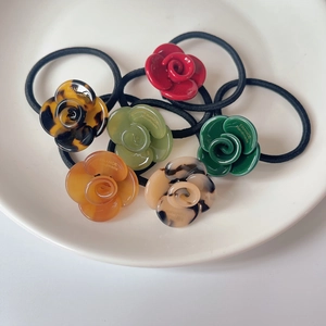 Elegant acetate camellia flower hair ties in multiple colors with high elastic bands