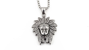 Detailed view of the antique silver Indian Chief pendant with fine feather textures