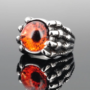 Gothic punk style devil eye ring with red dragon claw design and silver metal finish