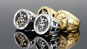Macro view showing Saint Michael relief and St. Michael Protect Us engraving on the ring