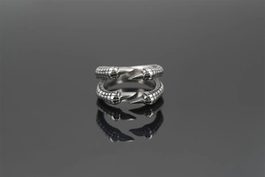 Detailed view of silver eagle claw ring with intricate scale texture and vintage finish