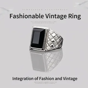 Vintage men's stainless steel ring with rectangle black stone and textured grid details