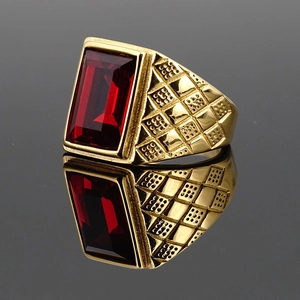 Vintage men's gold plated titanium ring featuring a large red rectangular gemstone
