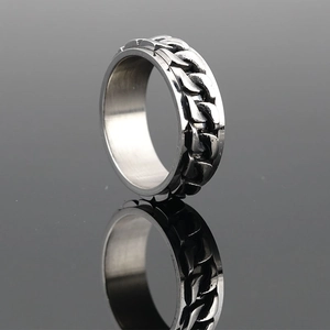 Polished stainless steel spinner ring with rotating curb chain for beer bottle opening