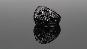 Macro detail of vintage tiger head ring with antique black finish and realistic lion relief