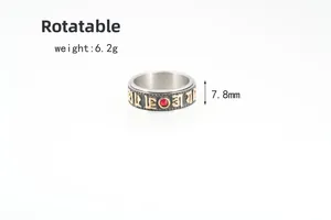 Detail view of rotating stainless steel mantra ring with crystal and 7.8mm width