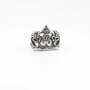 Retro crown ring in titanium steel with vintage hollow patterns and silver finish