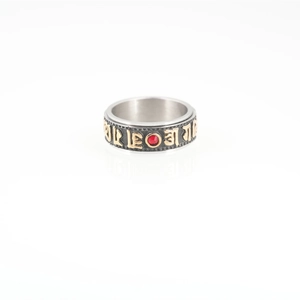 Rotating stainless steel Buddhist mantra ring with red crystal and gold engraving