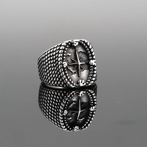Vintage silver compass ring for men with punk style texture and polished reflection