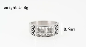 Macro shot of silver abacus ring with coin relief detailing, weighing 5.8g and 8.9mm wide